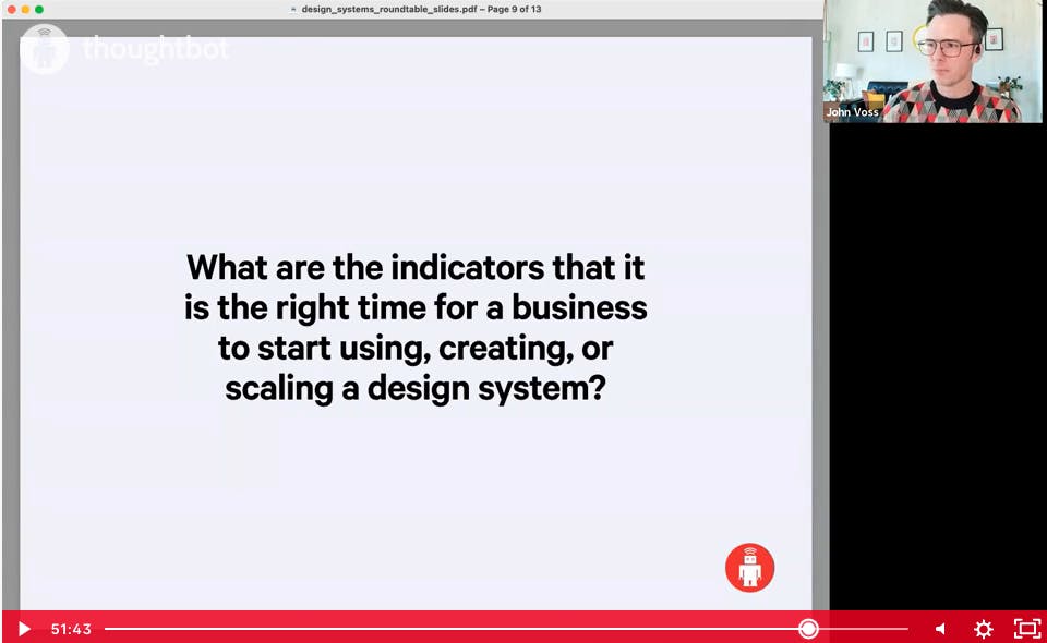 A screenshot of a video player with a thumbnail of a person in the top right and the main screen says What are the indivators that it is the right time for a business to start using, creating, or scaling a design system.