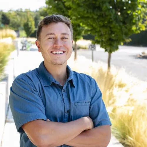 A headshot of Andrew Mewborn